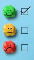 emoji checkboxes in smiley green with a checkmark, neutral yellow, and frowning red